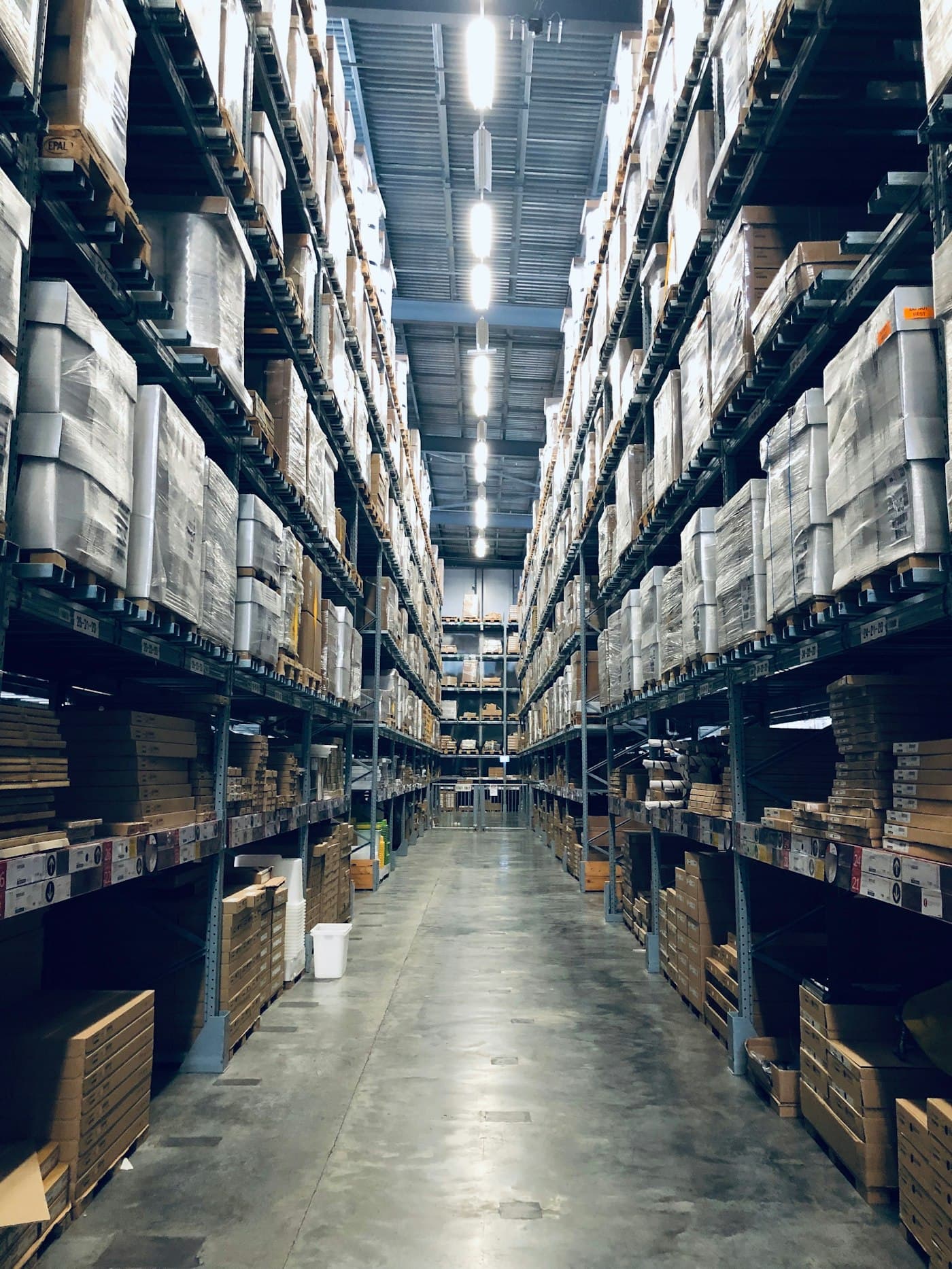 Modern export logistics warehouse with pallets and bagged agricultural commodities